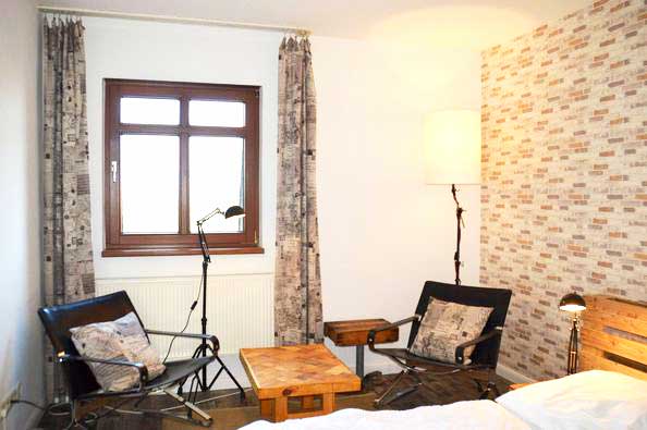 Upcycling und Design-Zimmer zeichen das Haus Fläming aus.